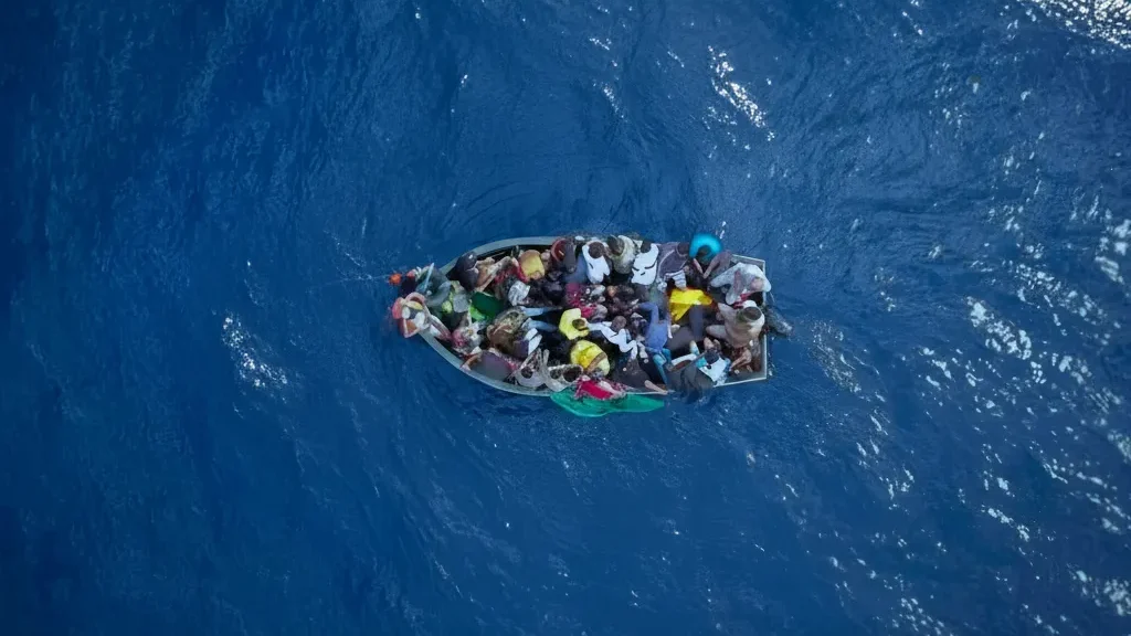 Refugees-on-a-boat-2 Jura Migrants
